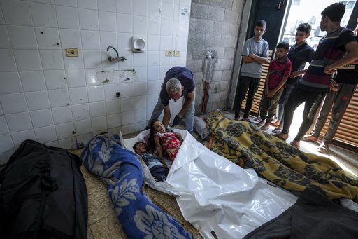 Israeli attack targets Hamas military commander and kills at least 90 people in southern Gaza Strip